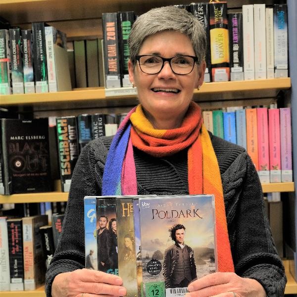 Frau mit Büchern in der Hand